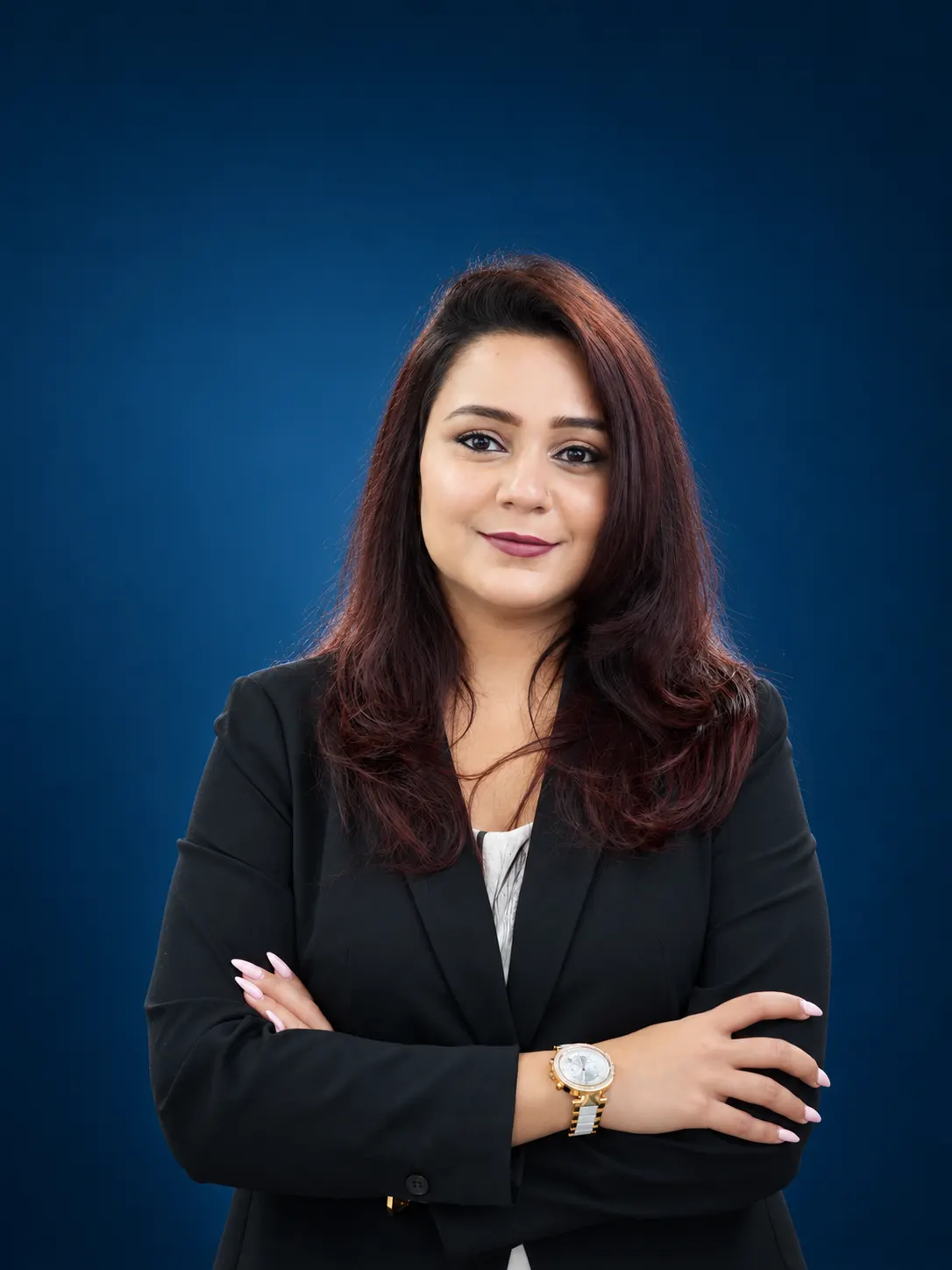 Veer & Sant property consultant in a black blazer, Dubai office team